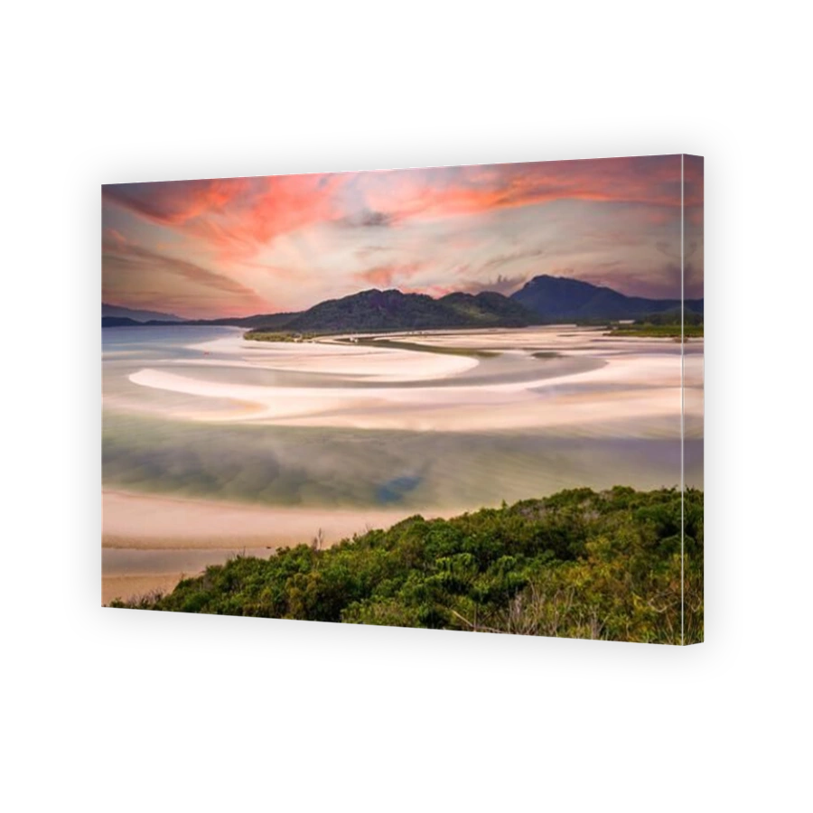 Beautiful sunrise from hill inlet lookout on Whitehaven beach at Whitsunday Island near Airlie Beach, Australia at low tide. The beautiful green