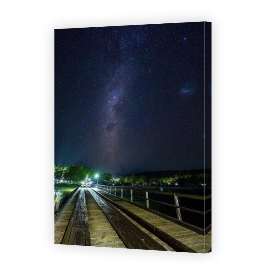 Kingfisher Bay jetty at night with Milky Way in sky, Fraser Island, Queensland Australia