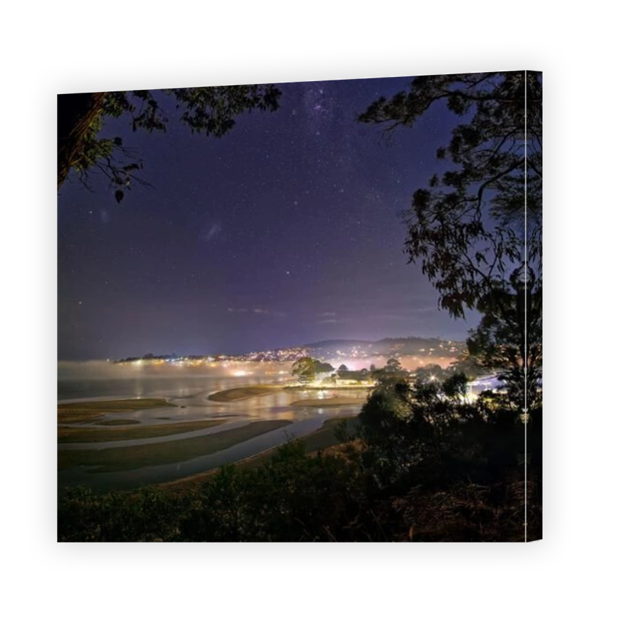 Image of Tyndall beach delta Browns river at night with stars and sea fog mist night lights from Alum Cliffs at Kingston, Hobart, Tasmania, Australia