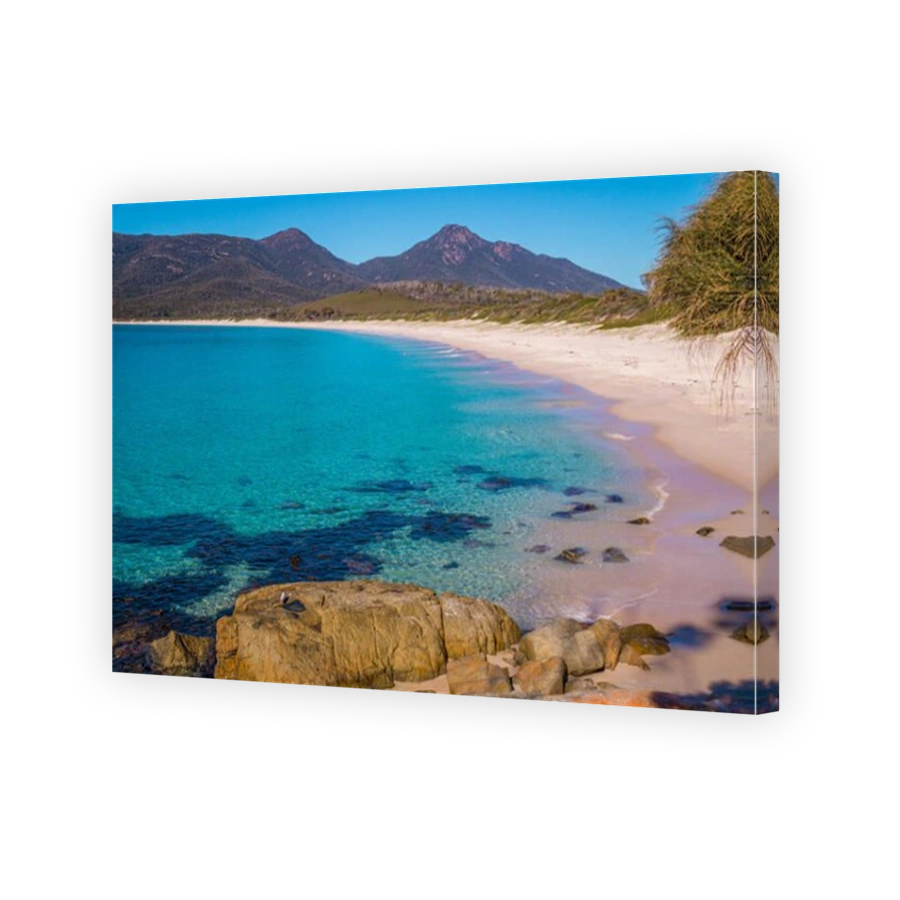 Crystal-clear waters of Wineglass Bay beach, Tasmania