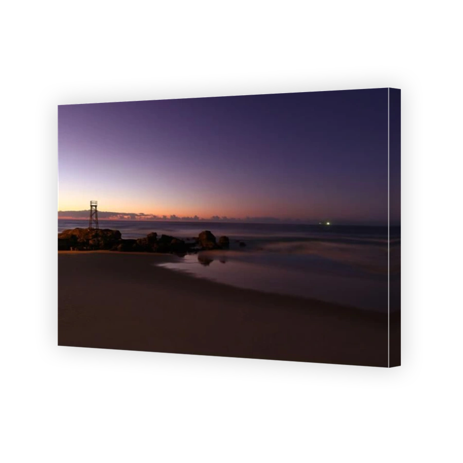 Redhead Beach - Newcastle Australia at sunrise. The beaches iconic wooden tower was used to look for sharks.