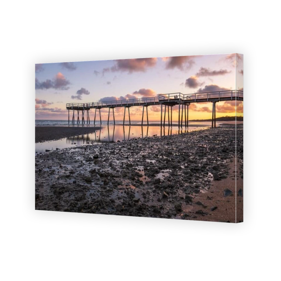 Tropical sunrise low tide beach