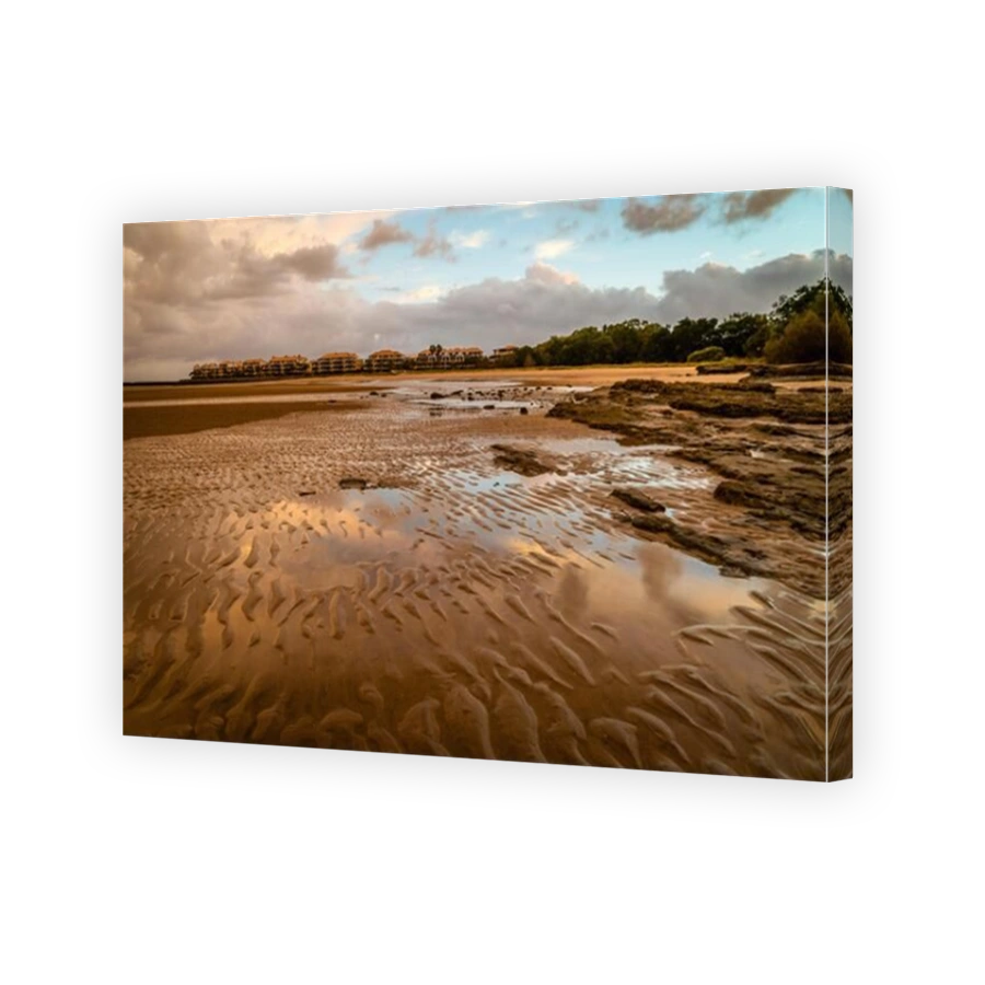 Small dunes of sand on the beach in Urangan, Queensland