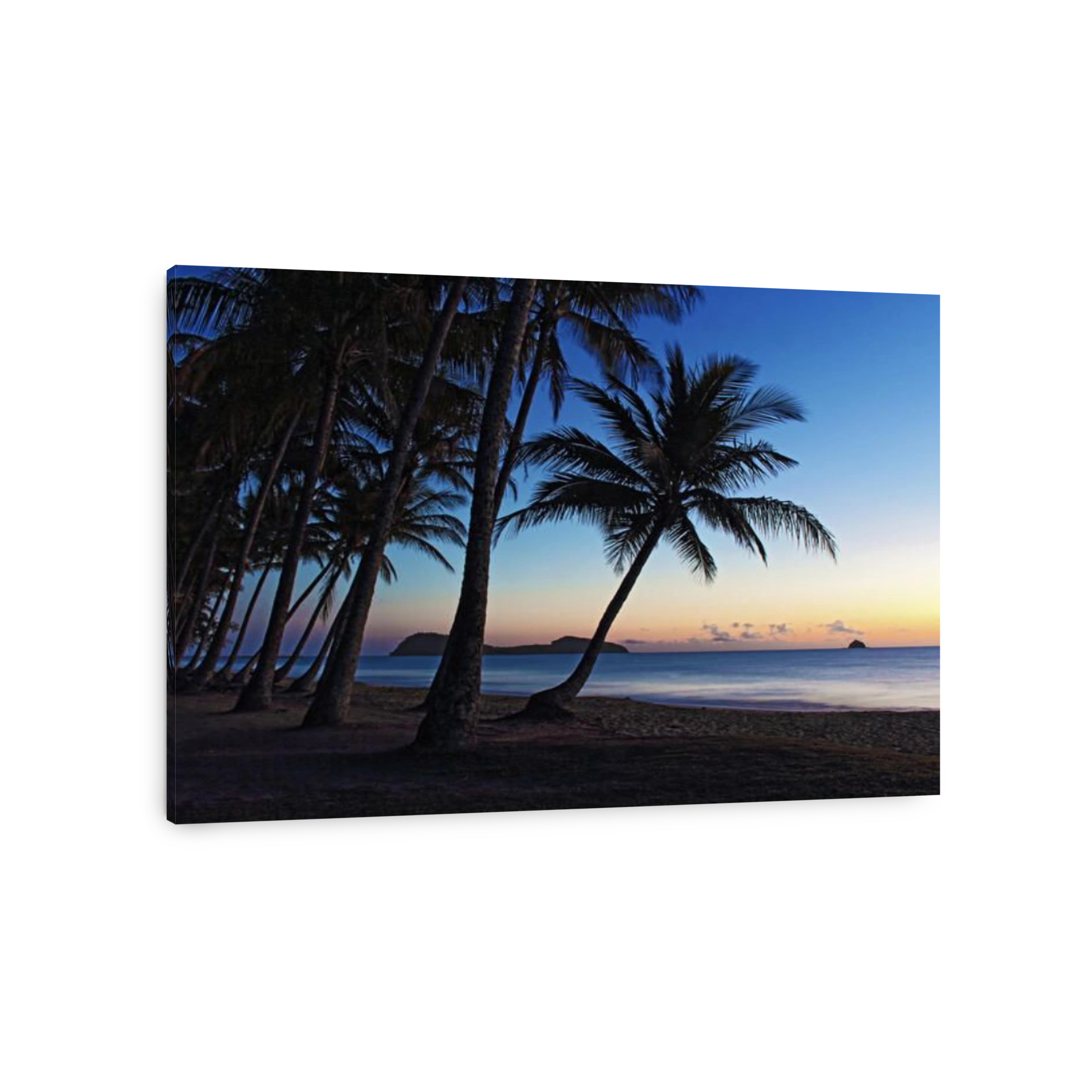 A cracking 1st Spring sunrise about to happen as day breaks at Palm Cove beach in tropical north Queensland, Australia