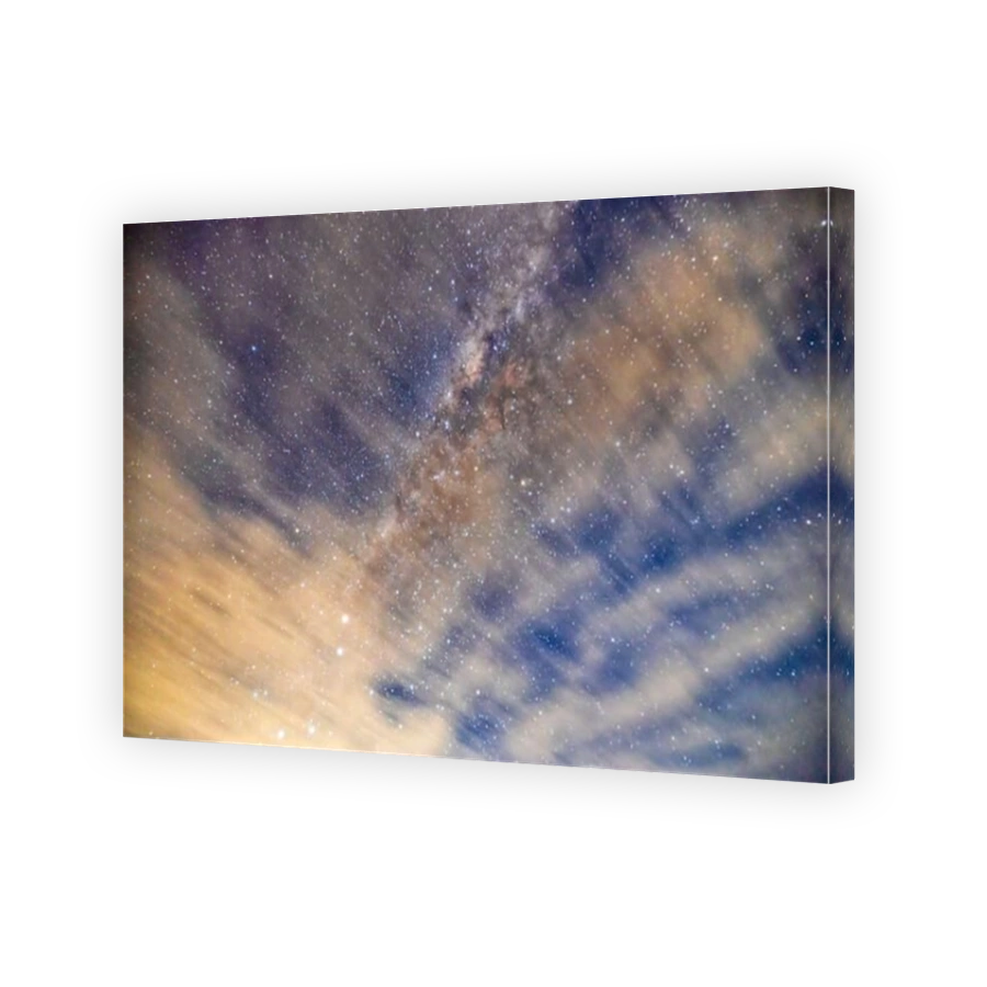 Blurred long exposure clouds and distant Milky Way in Southern Hemisphere from Australia.