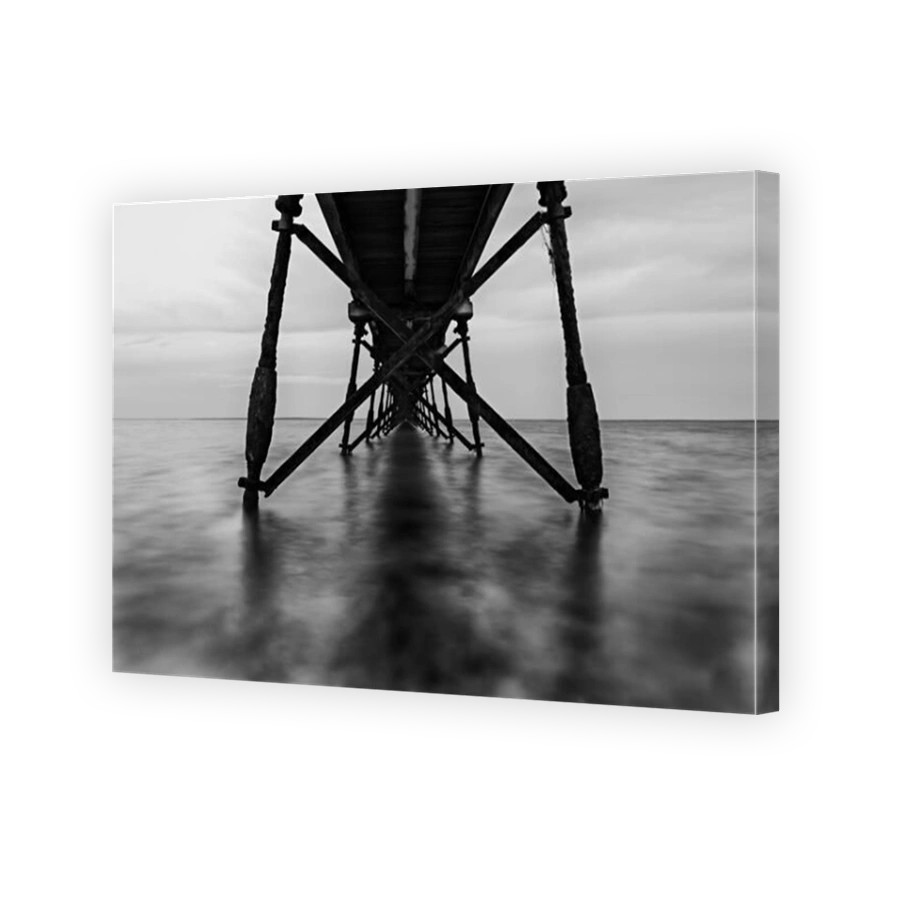perspective composition of historic timber jetty in Ceduna of South Australia from underneath in black white variant only