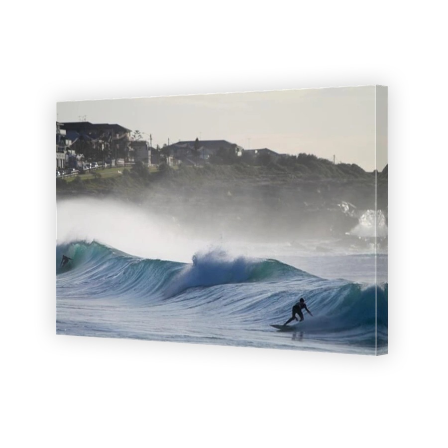 Two surfers facing each other