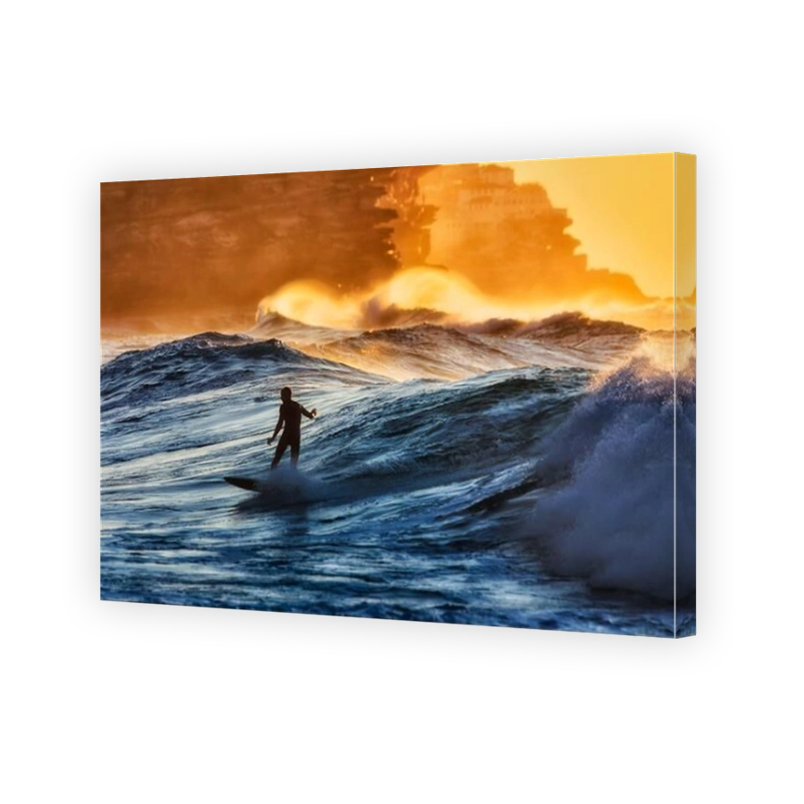Single male unrecognisable surfer sliding the wave at Bronte beach of Sydney Eastern Suburbs on Pacific ocean coast in sunny morning.