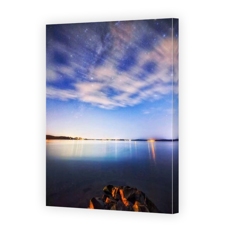 Waterfront of Lake Macquarie under bright Milky way starts in the sky - Australian stargazing.