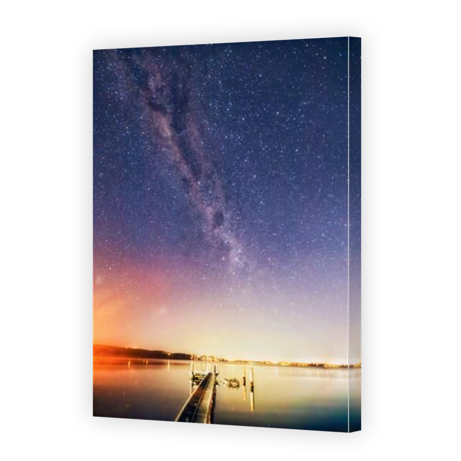 Reach bright contrast milky way conctellation reflecting in waters of Lake Macquarie of Australia at Murrays beach resort town.