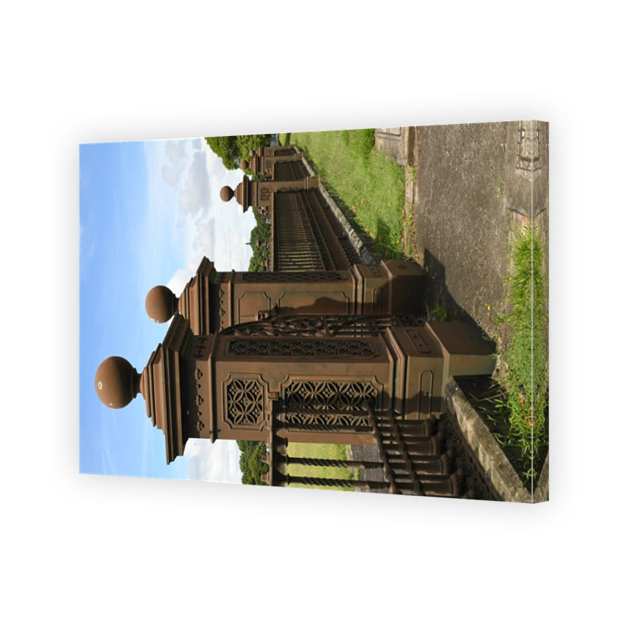 Ornate wrought iron railings surrounding heritage-listed Centennial Park Reservoir 1 on Oxford Street, Centennial Park, New South Wales, Australia.