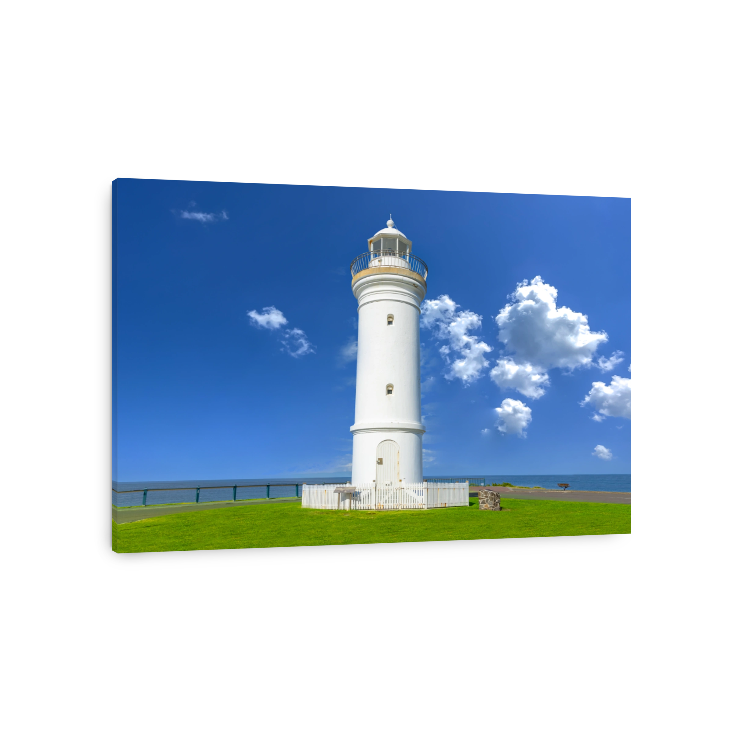 Beautiful lighthouse looking over the Pacific Ocean on cliffs of Kiama Sydney NSW Australia Coastal Beach fishing Town