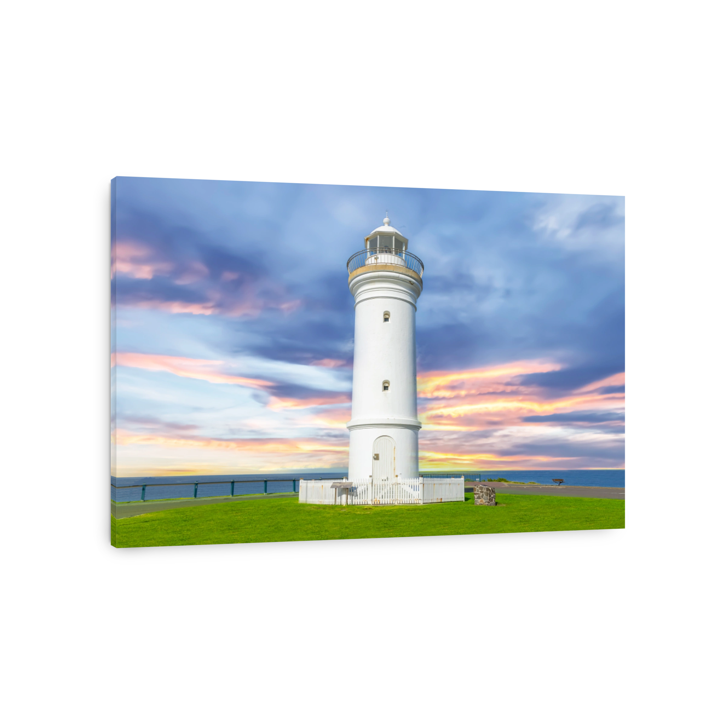 Beautiful lighthouse at Sunset over the Pacific Ocean on cliffs of Kiama Sydney NSW Australia Coastal Beach fishing Town