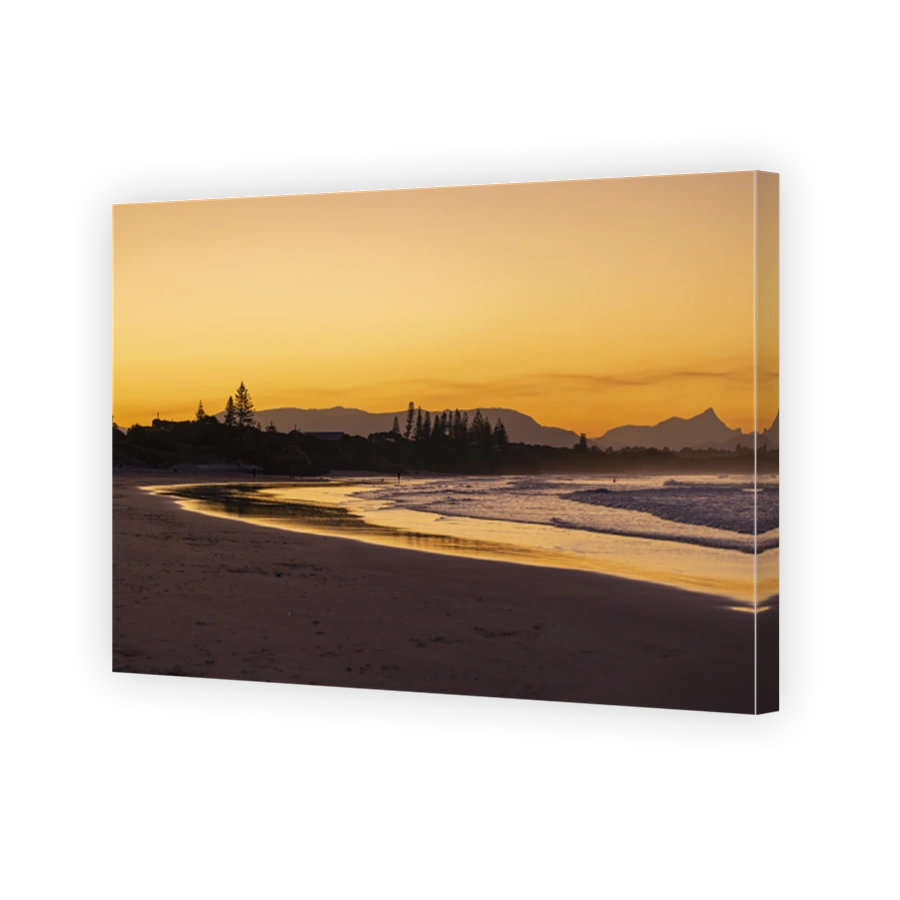 Sunset beach views across Main Beach in Byron Bay, New South Wales, Eastern Australia