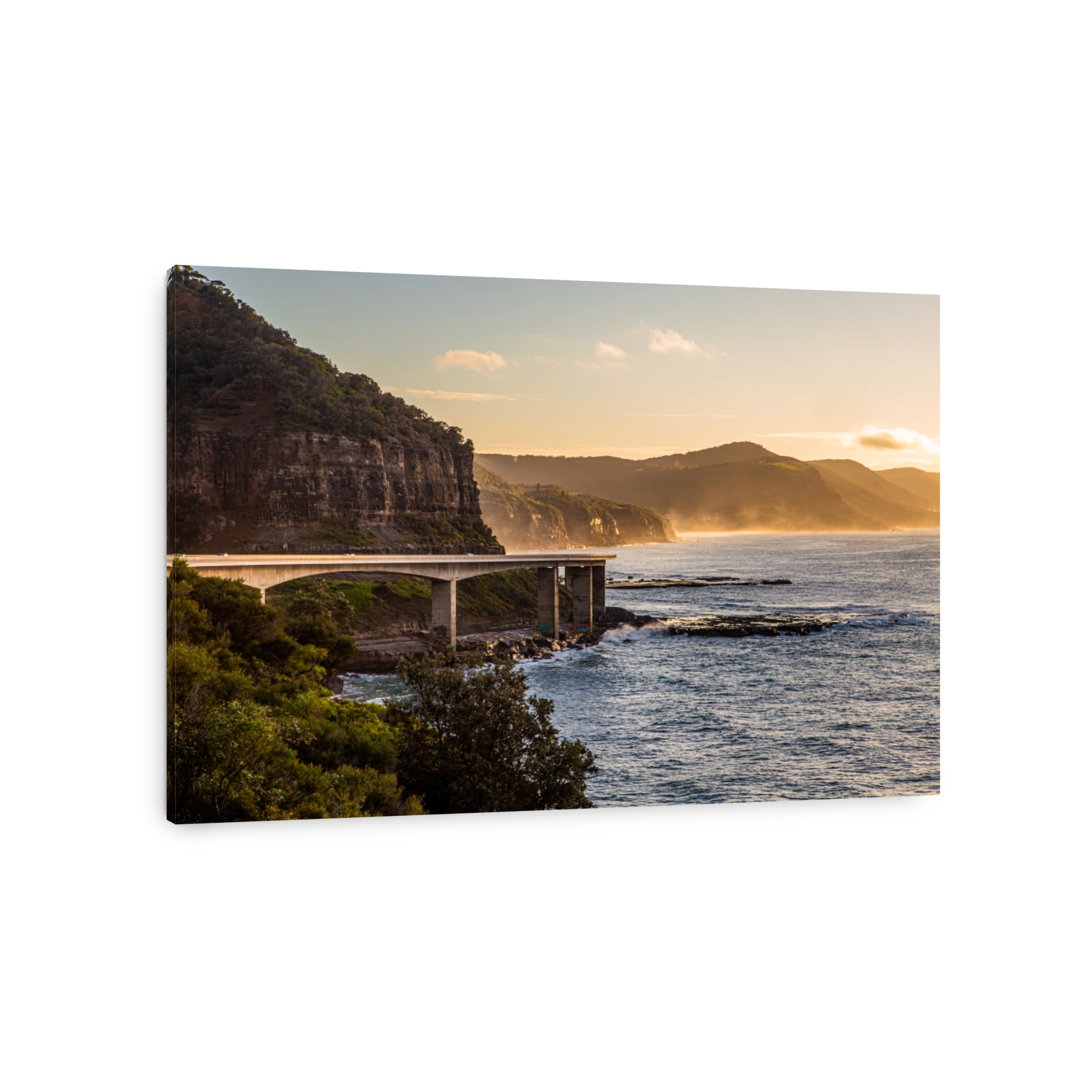 The view of the Sea Cliff Bridge between Sydney and Wollongong in the morning mist in the dawn