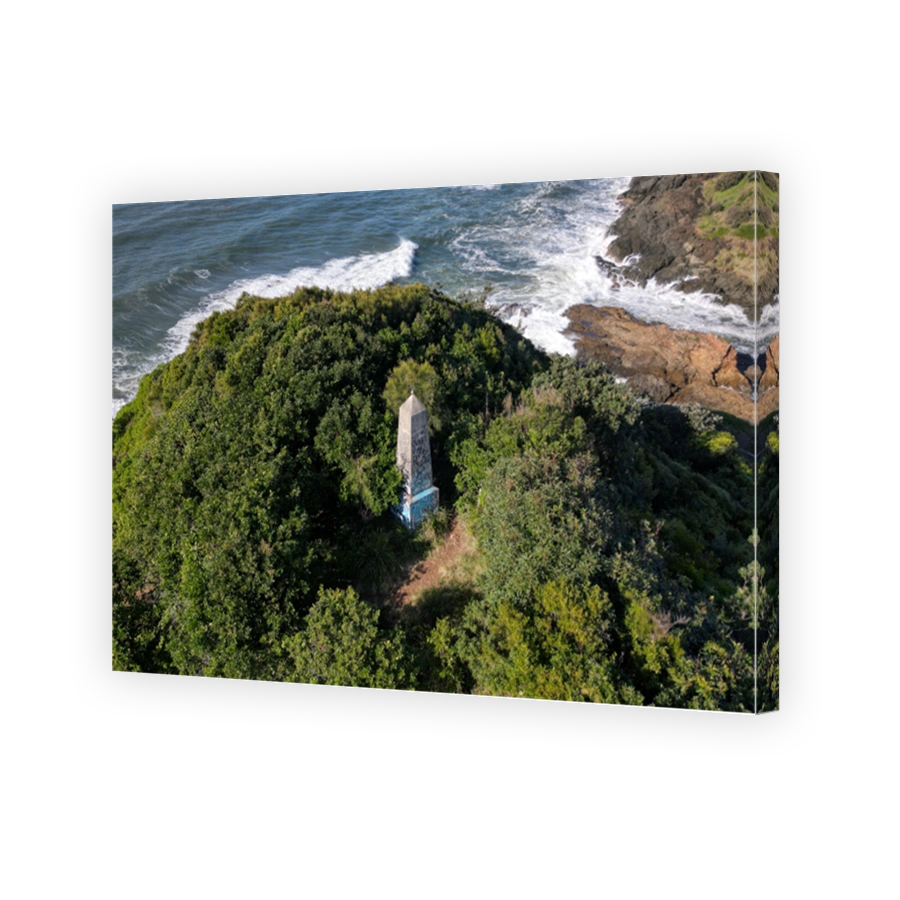 Aerial view of Flynns Beach with a monument on a sunny day in Port Macquarie , Australia