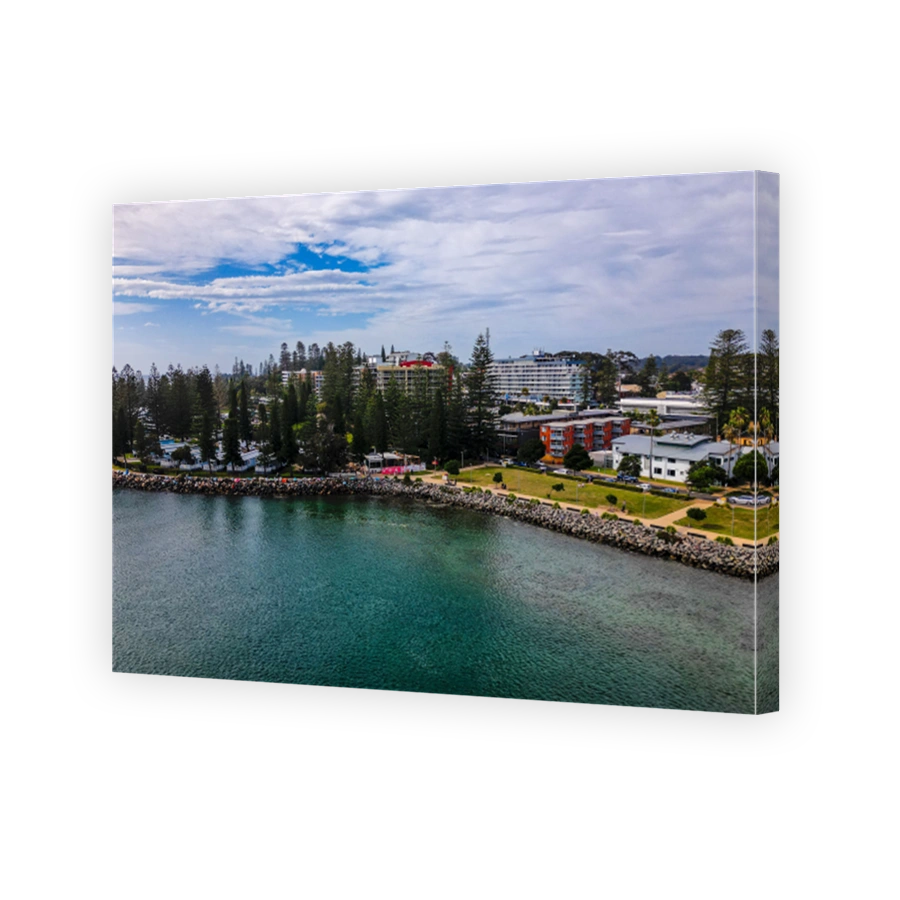 Aerial view of the coast of Port Macquarie on a sunny day in NSW, Australia
