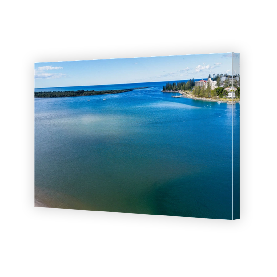 Aerial view of the calm coast and islands near Port Macquarie, New South Wales, Australia