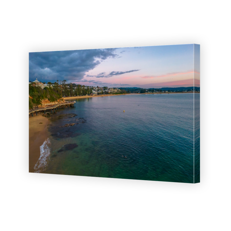 Aerial sunrise seascape with storm clouds rolling in
