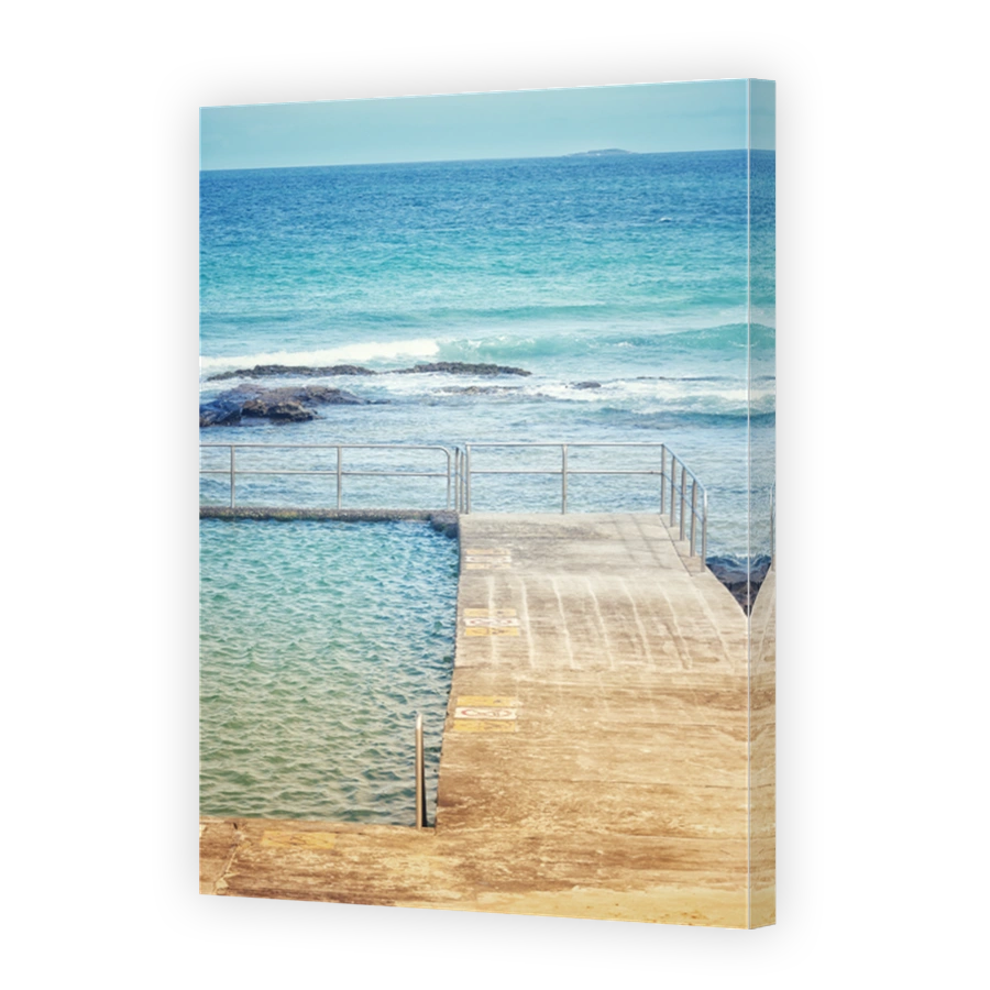 The water, steel and concrete’s colours and textures, ocean pool in Wollongong, NSW, Australia.