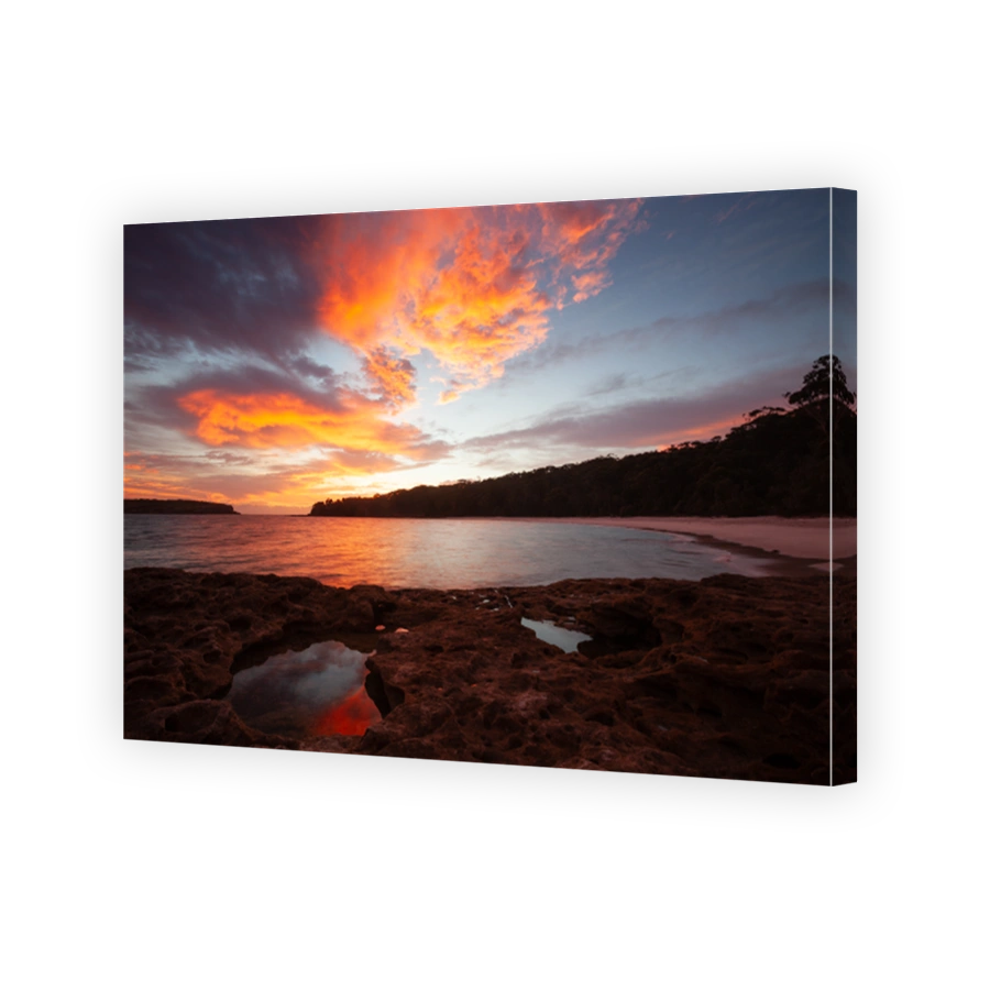 An idyllic vibrant sunrise over Murrays Beach, also known as the jewel in the Booderee National Park, located at the southern end of Jervis Bay on the NSW South Coast.