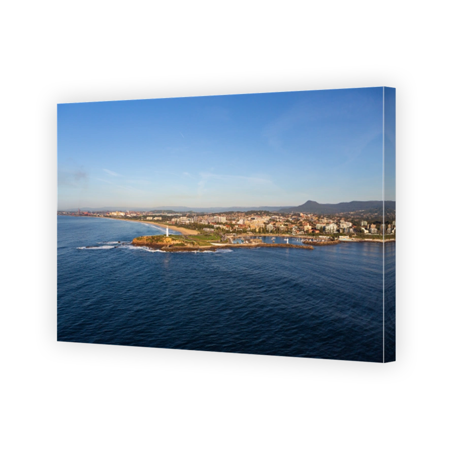 Wollongong's iconic Flagstaff Hill and harbour featuring its famous dual lighthouses looking south west to the Illawarra escarpment.