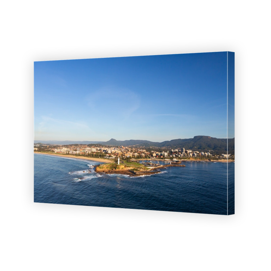 Wollongong's iconic Flagstaff Hill and harbour featuring its famous dual lighthouses looking south west to the Illawarra escarpment.