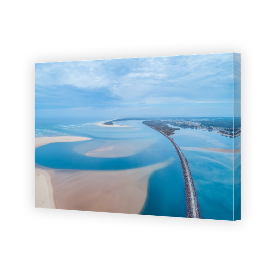 Aerial view of Harrington Breakwall and Manning River mouth. Harrington, New South Wales, Australia