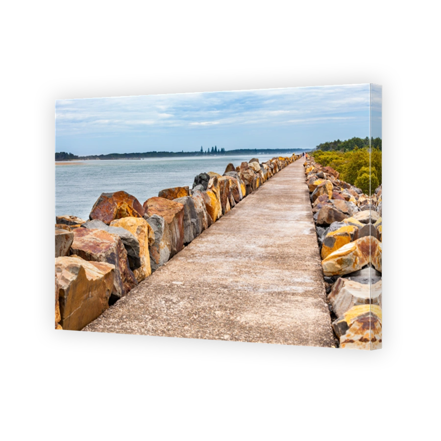 Long stretch of breakwall at Harrington, NSW, Australia