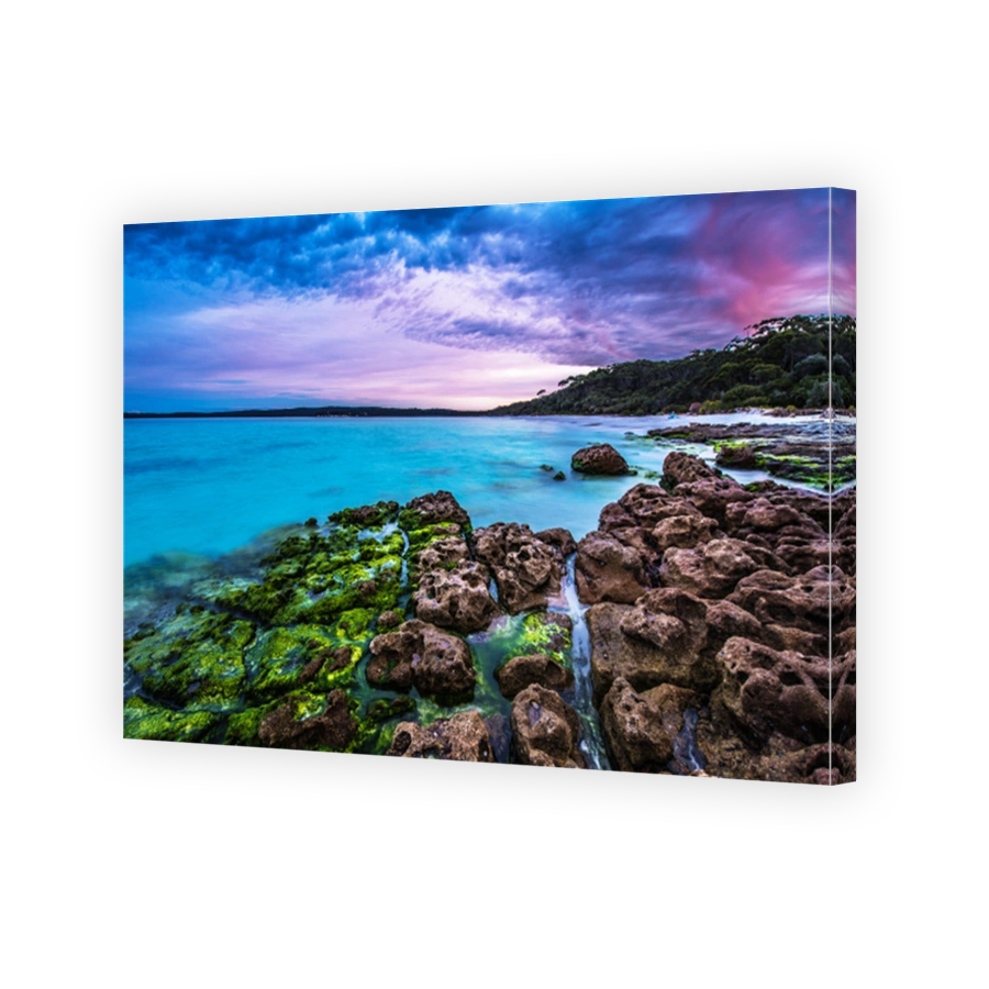 Mesmerizing cloudy sky over the sea with rocky coast