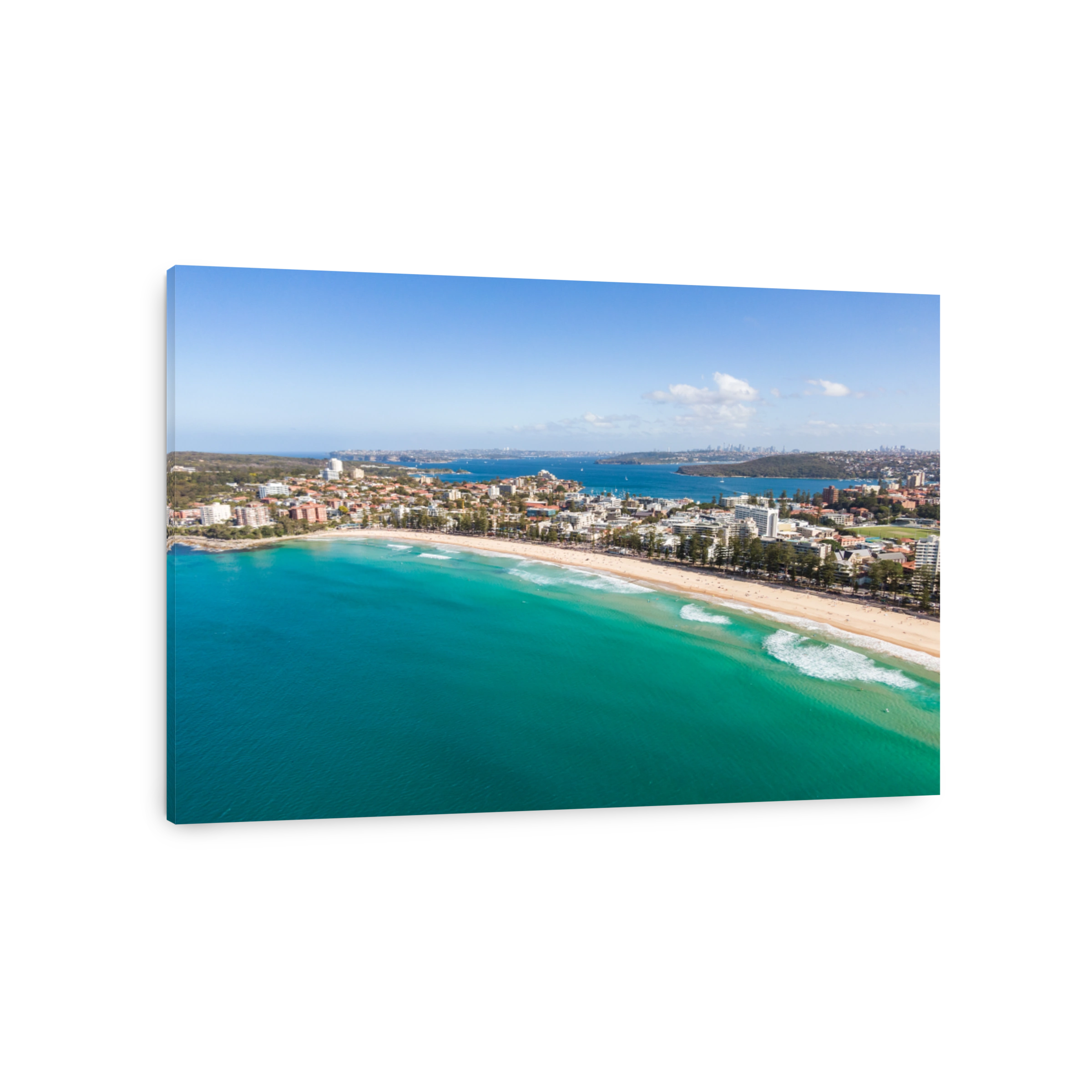 Panoramic high angle drone view of Manly Beach and the Sydney Harbour area. Manly is a popular suburb of Sydney, New South Wales, Australia. Famous tourist destination, easy to reach by ferry from CBD