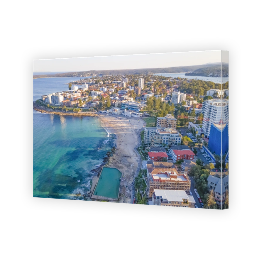 Aerial drone view above Cronulla in the Sutherland Shire, South Sydney, NSW looking toward South Cronulla Beach on a sunny afternoon
