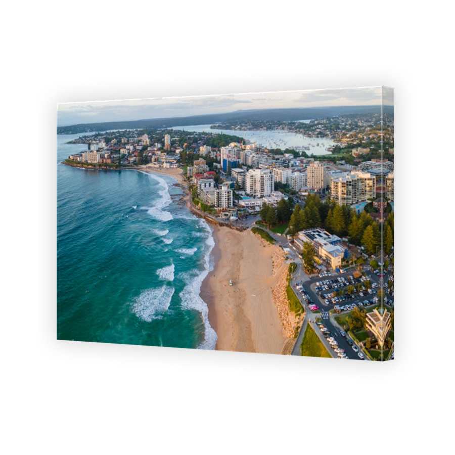 Aerial drone view over Cronulla in the Sutherland Shire, South Sydney, NSW looking toward Gunnamatta Bay on the Port Hacking during the early morning in February 2024