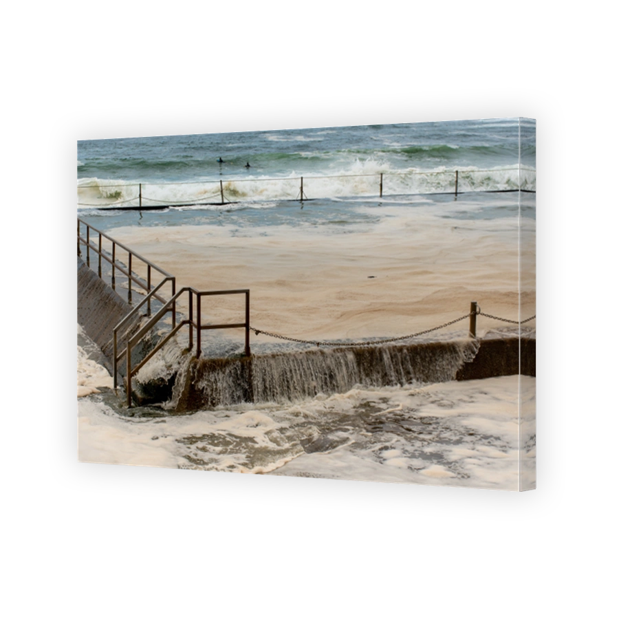 Turbulent rock pool after storm at Cronulla