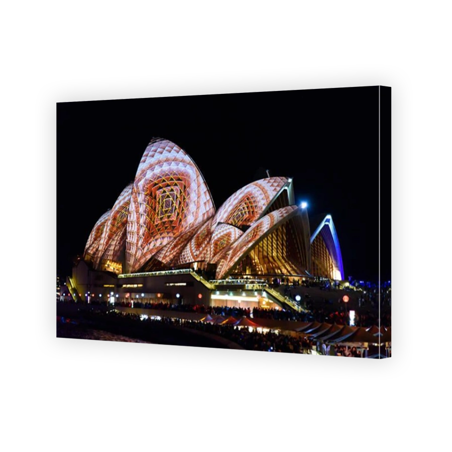 Light projection of colorful patterns on Sydney Opera House in Vivid Sydney Festival, New South Wales, Australia