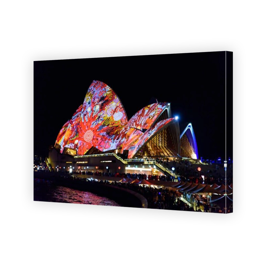 Light projection of colorful patterns on Sydney Opera House in Vivid Sydney Festival, New South Wales, Australia