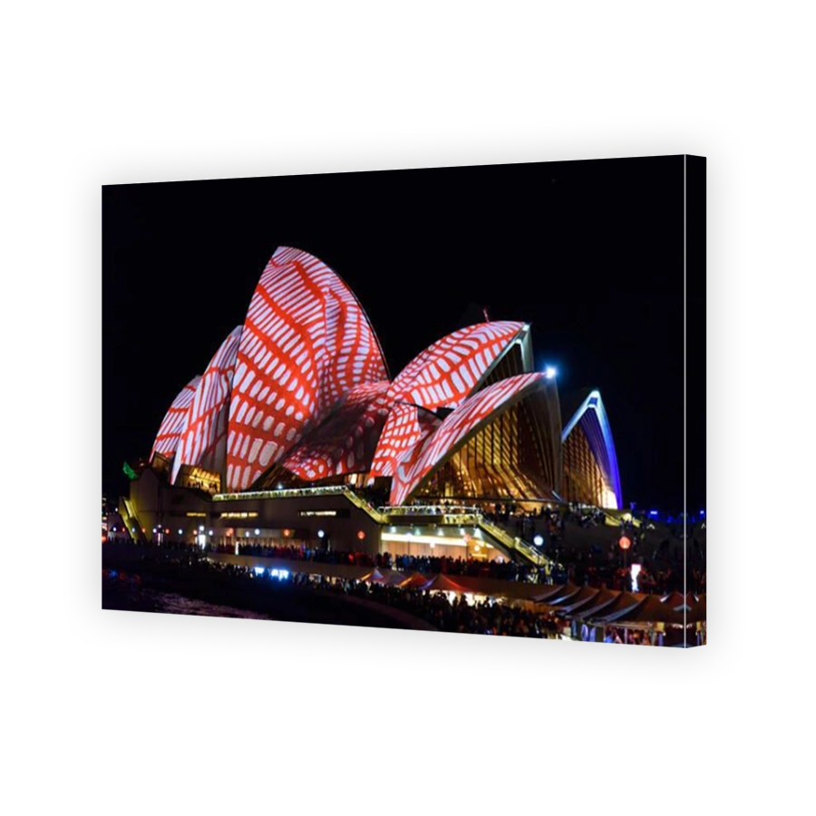 Light projection of colorful patterns on Sydney Opera House in Vivid Sydney Festival, New South Wales, Australia