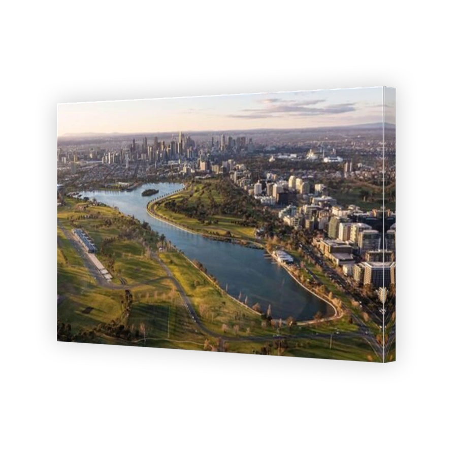 Melbourne Australia. Aerial view of Albert Park Lake and Grand Prix circuit with Melbourne skyline in background.