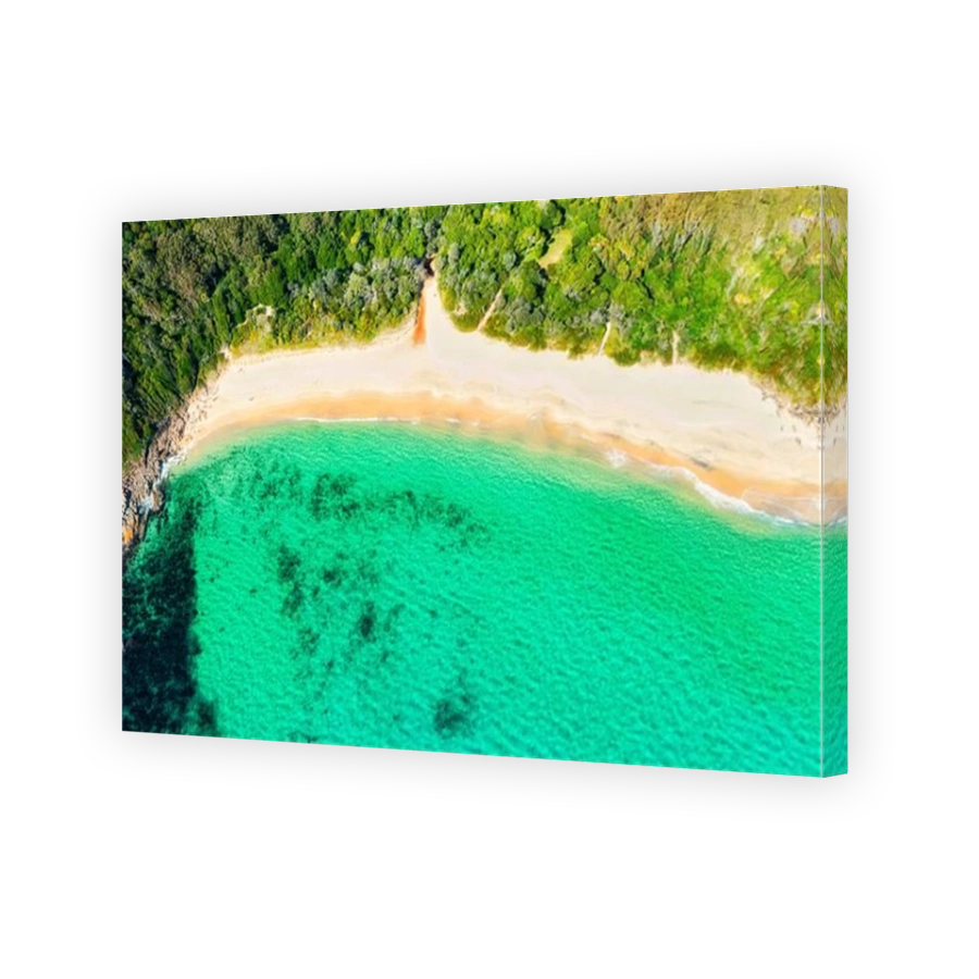 Shelly beach emerald bay in Elizabeth beach town on Pacific coast of australia - tropical aerial top down view.
