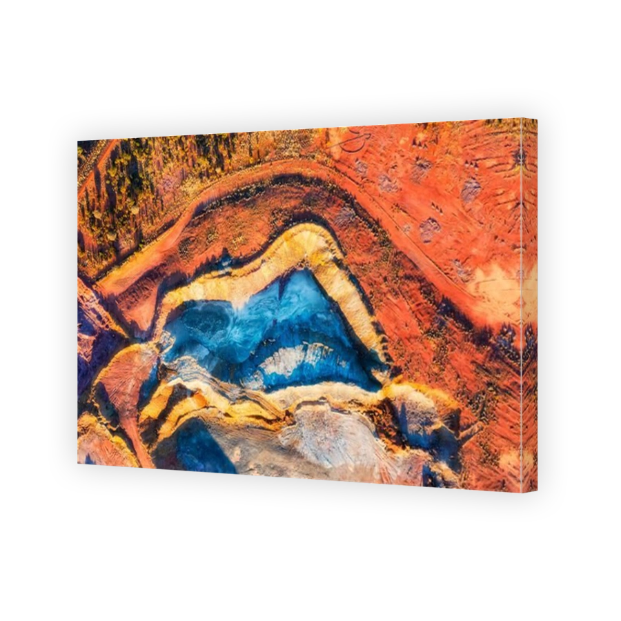 Colourful top down aerial view over open pit mine in Cobar copper town of Outback Australia.