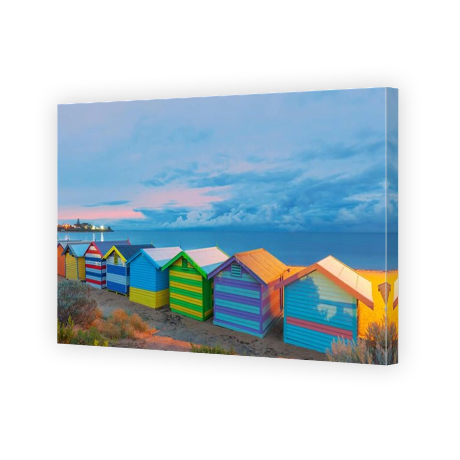 Happy Brighton beach huts, at pink sunrise, Melbourne, Victoria, Australia.
