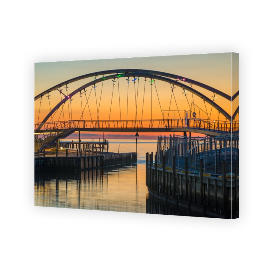 The beautiful sunset over the bridge in Frankston beach one of the suburbs in Melbourne, Australia.