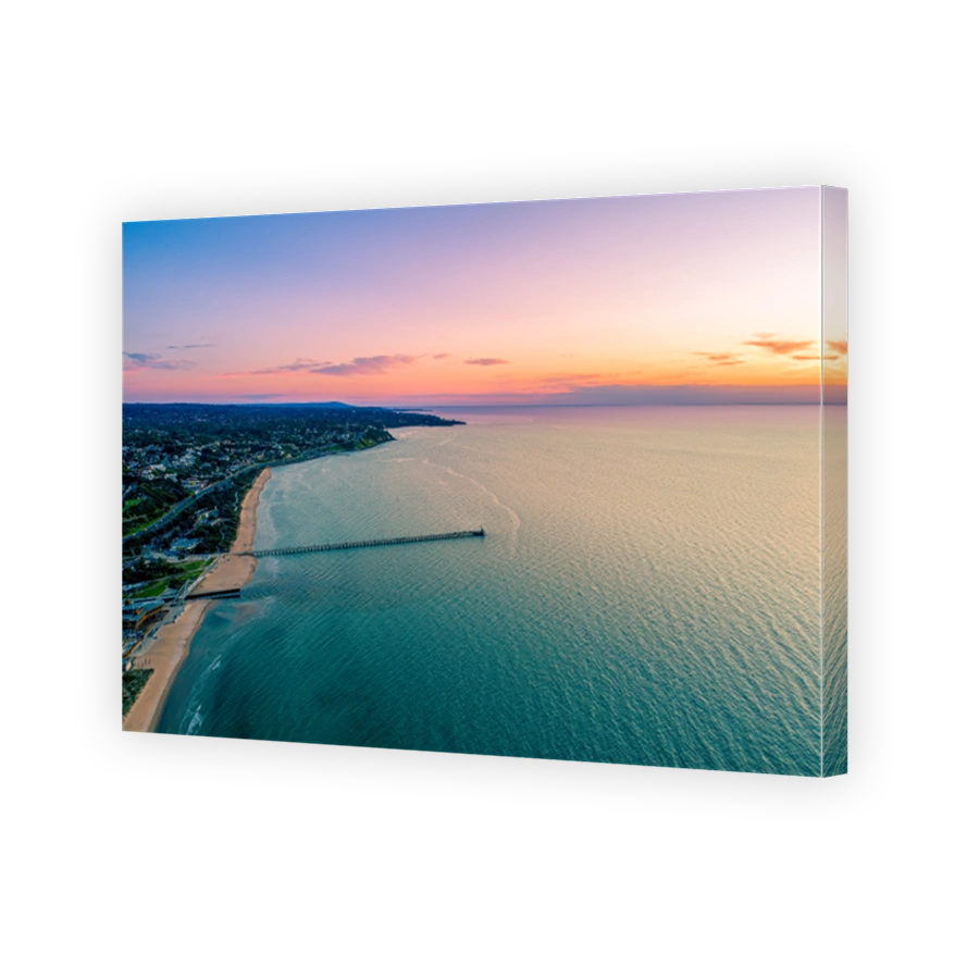 Beautiful sunset over Frankston waterfront and the pier - aerial view with copy space