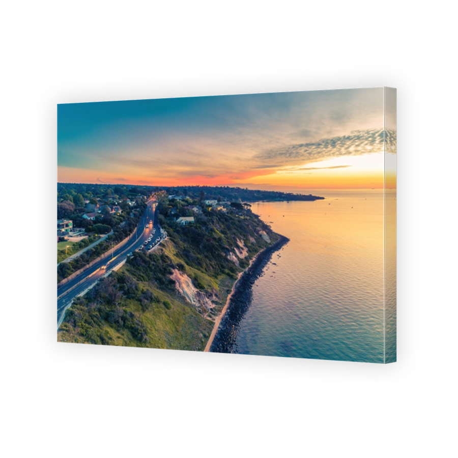 Aerial view of Nepean Highway passing through Olivers Hill in Frankston, Victoria at sunset