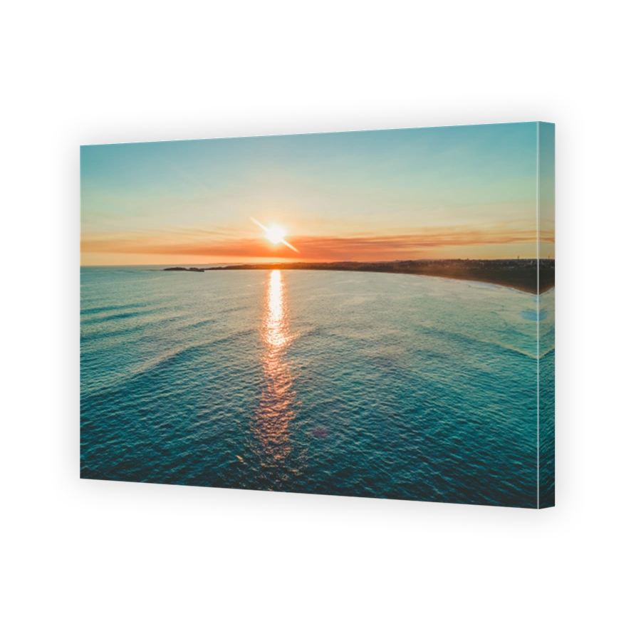 Sunset over ocean coastline with copy space - aerial view