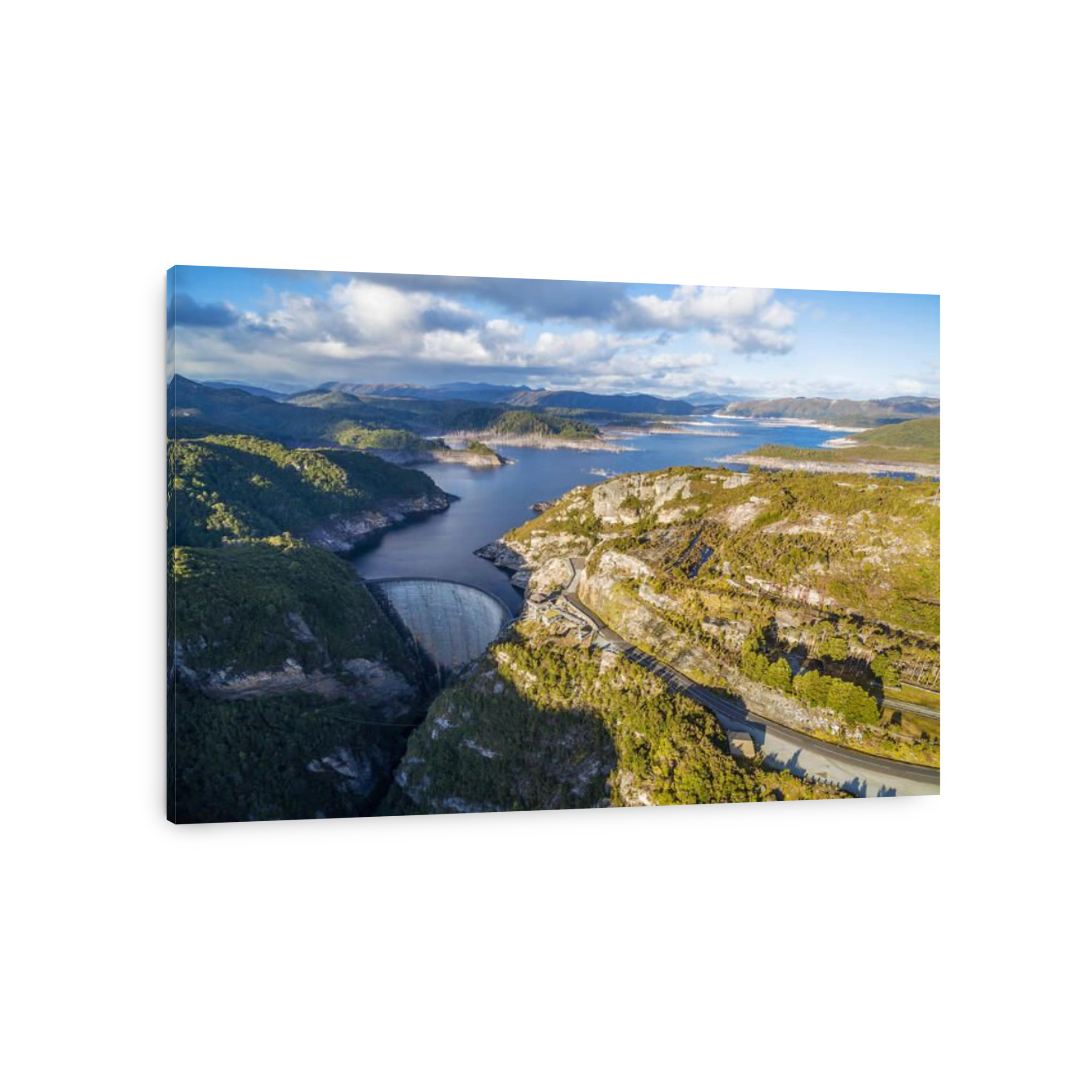 Aerial view of Gordon Dam and lake at sunset. Southwest, Tasmania, Australia