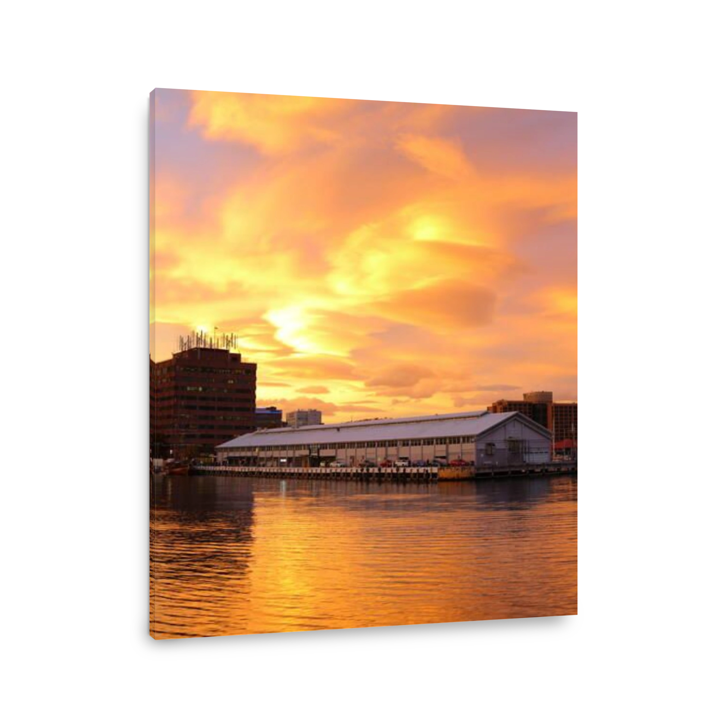 A vivid sunset over Elizabeth Street Pier and Sullivans Cove - Constitution Dock, Hobart, Tasmania, Australia.