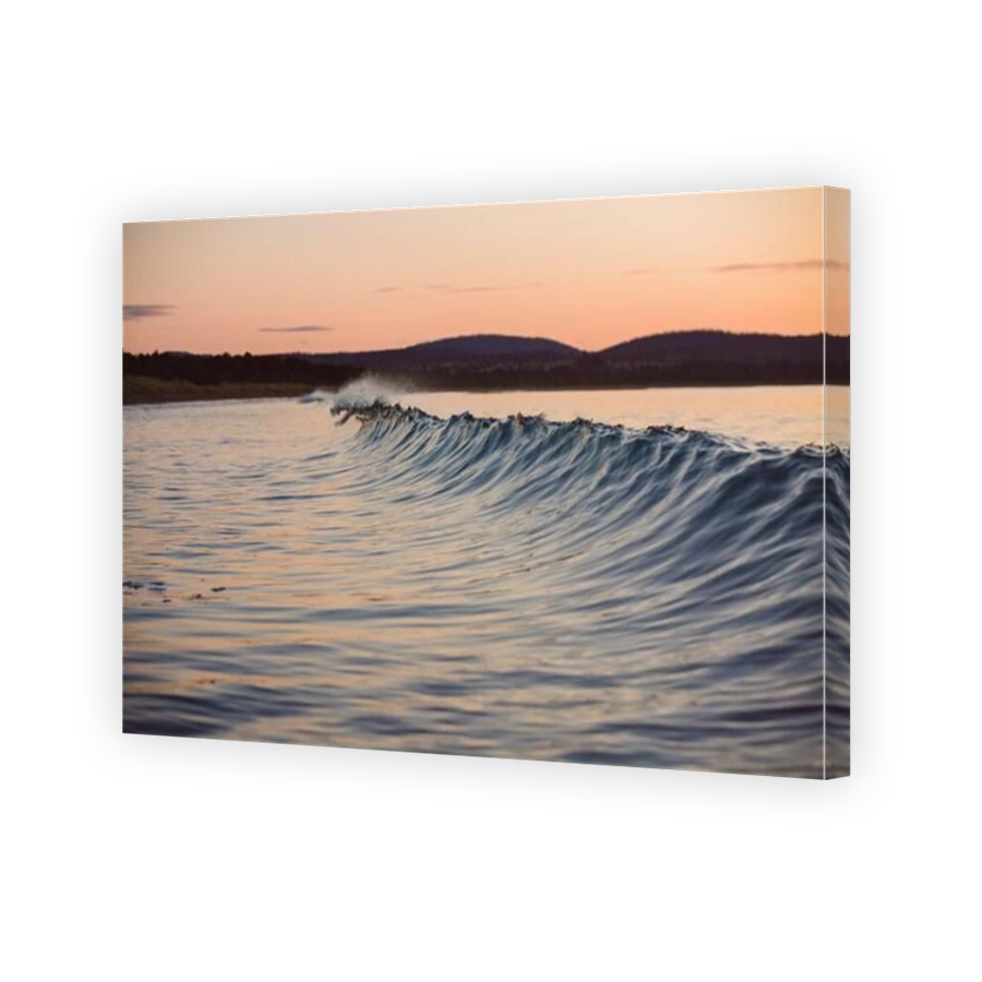 Sunrise at 7 mile Beach Tasmania Australia glassy waves and ripples