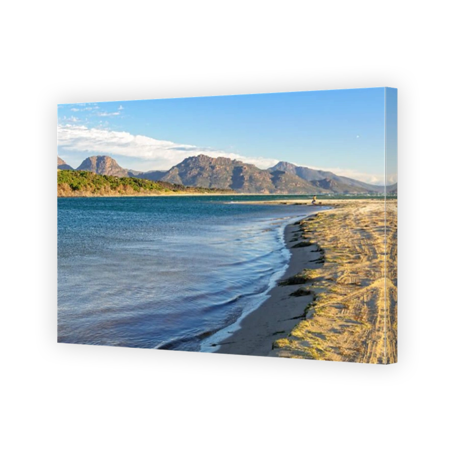 On the Nine Mile Beach near Swansea with the Freycinet National Park in the distance - Tasmania, Australia
