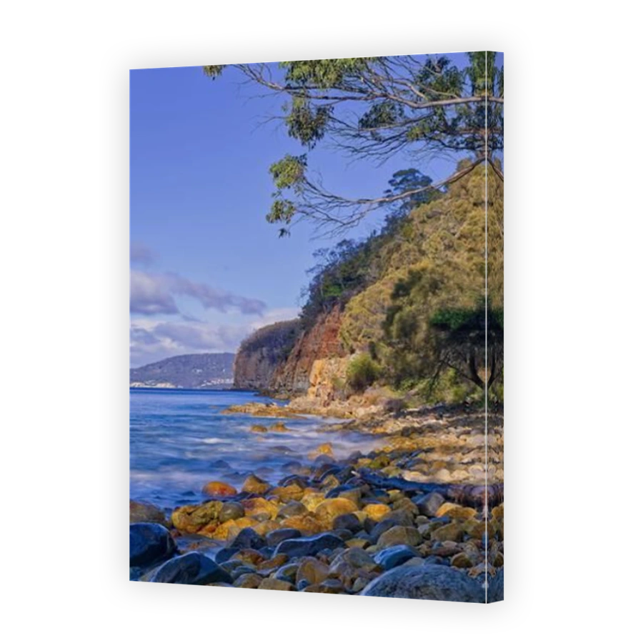 Derwent river ocean sea and Alum cliffs with beach and trees on sunny day at Taroona coastal discovery trail, Taroona, Hobart, Tasmania, Australia